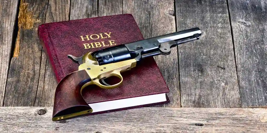 1851 revolver sitting on bible